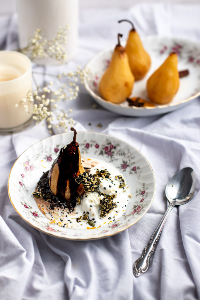 Spiced Poached Pears With Chocolate Sauce and Seeds Brittle